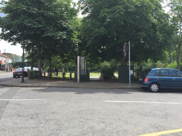 Figure 2: Green Wrythe Lane western side, looking south across William Road towards Wrythe Green. Can you see the path behind the telephone kiosk? 