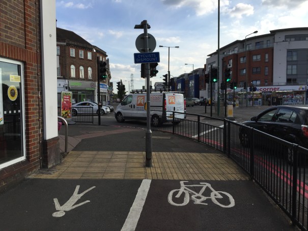 Rose Hill Roundabout by Wrythe Lane. What does this tell you about the priority given to cycling? 9& August 2015)